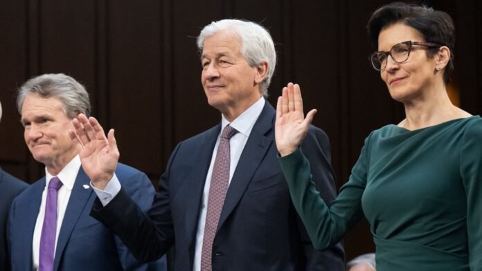 The performance of banks in Trump's economy can be attributed to several factors. During his presidency, the banking sector experienced significant growth, largely due to the implementation of business-friendly policies and deregulation efforts. 

One major factor contributing to the success of banks was the Tax Cuts and Jobs Act (TCJA), which lowered the corporate tax rate from 35% to 21%. This reduction in taxes resulted in increased profits for banks, as they were able to retain more of their earnings. 

Additionally, the deregulation of the financial industry, particularly the revision of the Dodd-Frank Act, eased regulatory burdens on banks. The Economic Growth, Regulatory Relief, and Consumer Protection Act (EGRRCPA) signed into law in 2018, raised the threshold for systemically important financial institutions (SIFIs) from $50 billion to $250 billion in assets, reducing the number of banks subject to stricter regulations. 

The strong economy, characterized by low unemployment and rising interest rates, also contributed to the success of banks. As interest rates increased, banks were able to earn more from their lending activities, further boosting their profits. 

However, the thriving banking sector also raises concerns about the potential for excessive risk-taking and the impact on income inequality. The deregulation of the financial industry and the concentration of wealth among large banks may lead to increased systemic risk and decreased access to financial services for low-income communities. 

Overall, the performance of banks in Trump's economy is a complex issue, reflecting both the positive effects of deregulation and tax cuts, as well as the potential negative consequences of increased risk-taking and income inequality.