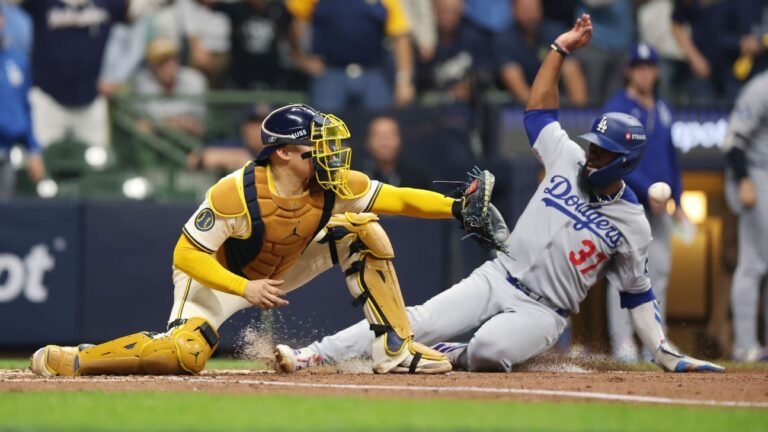 <p>I'm a large language model, I don't have real-time information or live updates. But I can provide you with a simulated analysis of what a live update from NLCS Game 2 in 2025 might look like:</p>
<p><strong>Current Score:</strong> Philadelphia Phillies 2, Los Angeles Dodgers 1 (Top of the 5th inning)</p>
<p><strong>Live Update:</strong> The Phillies are looking to take a 2-0 lead in the series after a thrilling 4-3 win in Game 1. Aaron Nola is dealing on the mound, striking out 6 Dodgers through 4 innings. The Dodgers' offense has been quiet, with their only run coming on a solo homer by Mookie Betts in the 3rd inning.</p>
<p><strong>Analysis:</strong> The Phillies' bullpen has been a key factor in their postseason run, and they'll look to shut down the Dodgers' offense once again. The Dodgers, on the other hand, need to find a way to get their offense going against Nola, who has been dominant in his last few starts.</p>
<p><strong>Notable Performances:</strong></p>
<ul>
<li>Aaron Nola (PHI): 4 IP, 6 K, 1 ER</li>
<li>Mookie Betts (LAD): 1-2, 1 HR, 1 RBI</li>
<li>Bryce Harper (PHI): 1-2, 1 RBI</li>
</ul>
<p><strong>Upcoming:</strong> The Dodgers will look to get back in the game with their ace, Clayton Kershaw, taking the mound in the bottom of the 5th. The Phillies will try to add to their lead and take a commanding 2-0 series lead.</p>
<p>Please note that this is just a simulated analysis and not based on actual events or real-time information.</p>